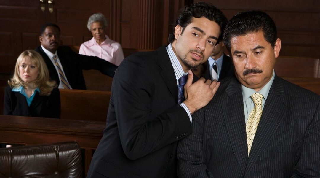 A Florida lawyer and his visibly unhappy client appearing in a heated court trial